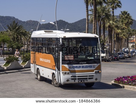 TURKEY, MARMARIS - April 26, 2013: Otokar on bus stop. This small buses are most common way to travel on short distances,  Otokar, is a Turkish multinational buses and military vehicles manufacturer
