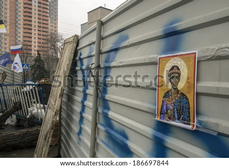 UKRAINE, LUGANSK - April 11, 2014: Orthodox icon on the barricade near the Ukrainian regional office of the Security Service in Luhansk