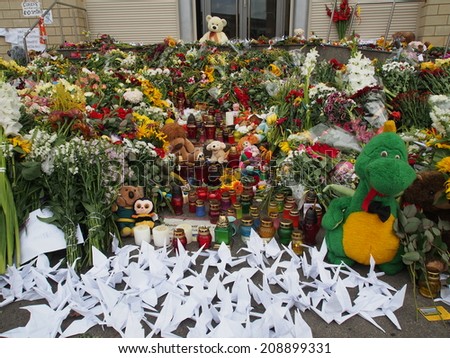 KYIV, UKRAINE - July 19, 2014:  People gathered at the Dutch embassy in Kiev on  July 19, 2014. People gathered to mourn for the victims of Malaysian Airlines flight 17