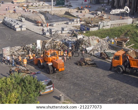 UKRAINE, KYIV - 14 Aug, 2014: Aerial view communal machinery running  the barricades on the Instutuskaja street set up November 2013 by angry anti-government protesters.