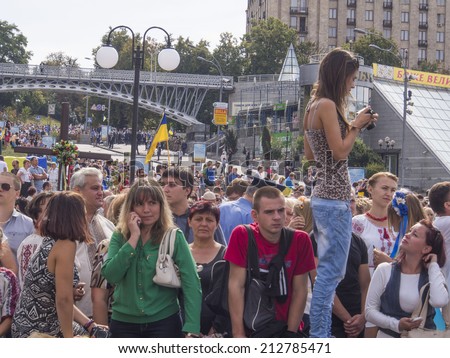 UKRAINE, KYIV - 23 Aug, 2014: Parade spectators. -- In Kiev, the first time in five years, was the official military parade. The sixth in the history of independent Ukraine.
