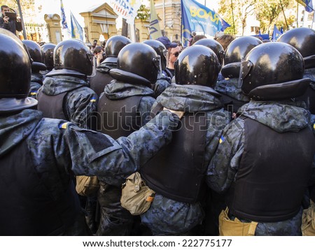 KIEV , UKRAINE - October 10, 2014:  Police blocking the passage to the building of the Presidential Administration from Avtomaydan activists