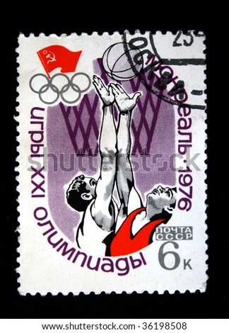 USSR - CIRCA 1976: A stamp printed in the USSR shows basketball, devoted Summer Olympic Games in Montreal, one stamp from series, circa 1976.