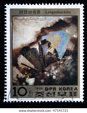 DPR KOREA - CIRCA 1986: A stamp printed in DPR KOREA (North Korea) shows semiprecious stone Lengenbachite, circa 1986