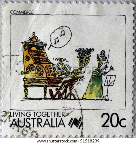 AUSTRALIA - CIRCA 1960s: A stamp printed in Australia shows Man plays the tune on the cash register him accompanied the woman on the violin, circa 1960s