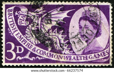 CIRCA 1958: A stamp printed in Britain showing a Welsh dragon celebrating the British Empire and Commonwealth games, circa 1958
