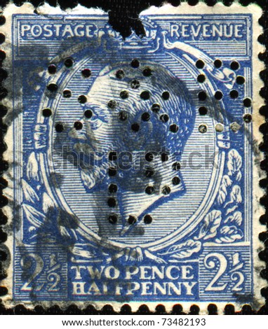 UNITED KINGDOM - CIRCA 1912 to 1924: Stamp printed in the UK show an English Used Nine Pence Green Postage Stamp showing Portrait of King George V, circa 1912 to 1924