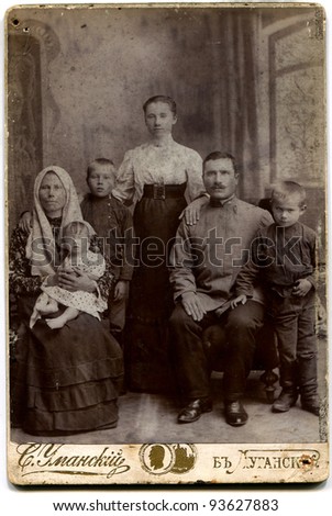 RUSSIA - CIRCA end of the XIX - the beginning of XX century: An antique photo shows family of the worker Lugansk, Russian Empire, now Ukraine Russian text: Umanskiy (name of photographer), Lugansk