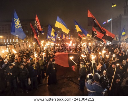 KIEV, UKRAINE - January 1, 2015: The torchlight procession in honor of the birthday of Stepan Bandera was held in the city center. It was attended by about four thousand people