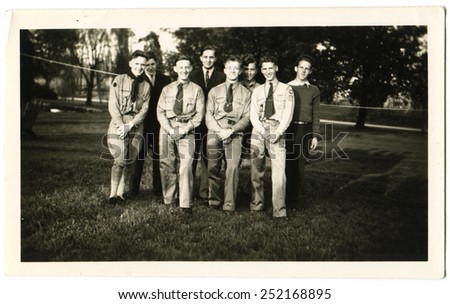 CANADA - CIRCA 1940s: Reproduction of an antique photo shows group of scouts and students posing on the lawn in the park