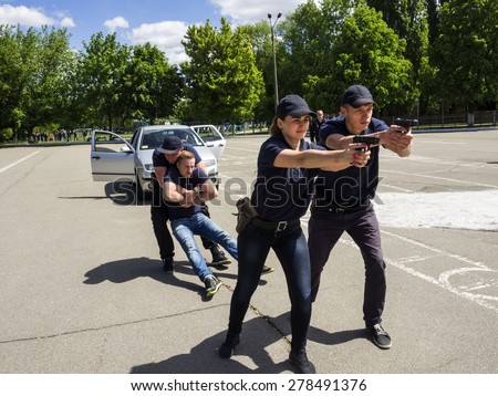 KIEV, UKRAINE - MAY 16, 2015: Students of Institute for Police training Ukraine on practical exercises.  Training of future police officers conducted by experienced Ukrainian and American instructors.