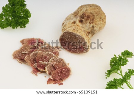 White truffle from Tuscany, partly sliced.