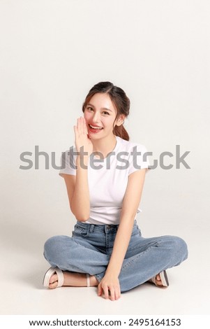 Similar – Foto Bild Trendy asiatische Frau sitzt auf Metallfass in dunklem Studio