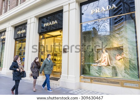 Melbourne, Australia - August 16, 2015: People passing by The Collins Street Prada store in Melbourne\'s CBD. The street is a major street in the central Melbourne.