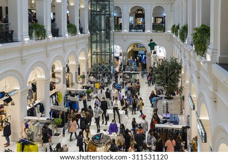 Melbourne, Australia - August 8, 2015: People shopping in H & M flagship Australian store in Melbourne. H&M is a well-known international fashion retail corporation.