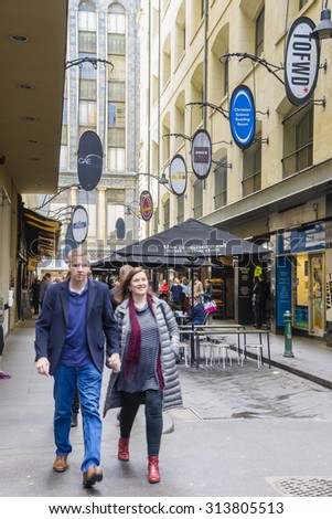 Melbourne, Australia - August 30, 2015: People walking along Degraves street in Melbourne in the morning. Degraves Street is one of the famous city laneways in Melbourne.