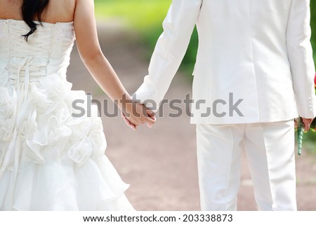 Asian couple with pre-wedding scene out door background.