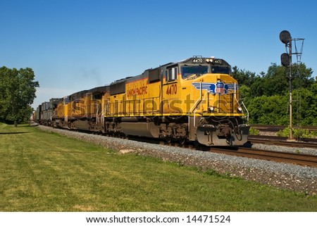 BEREA, OH - JUNE 16: A Union Pacific Freight Train travels east on CSXT tracks June 16, 2008 in Berea, Ohio. The Union Pacific railroad uses CSX Transportation track via a trackage rights agreement.