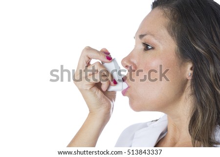 Female doctor is using a pressurized cartridge inhaler on a medical demostration - Isolated on a white background - Copy space area available  Imagine de stoc © 