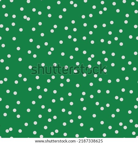 Polka dot seamless pattern. Abstract random flying colorful confetti. Trendy print in green and white colors for fabric, textile, gift wrapping paper, wallpaper. Vector illustration