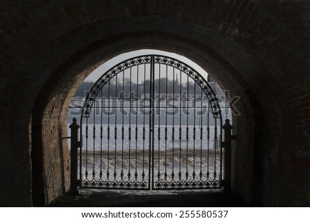 The iron gate in the Kremlin wall. Veliky Novgorod, Russia