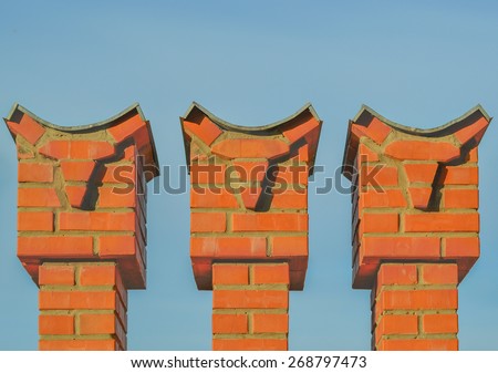 Three brick towers. Background