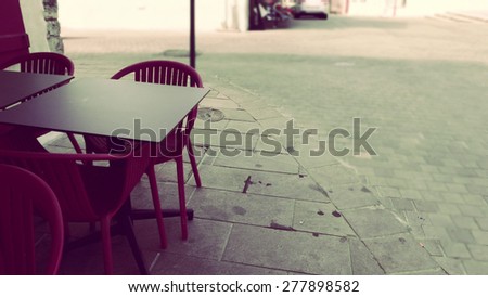 The waiting time table with chairs on market place