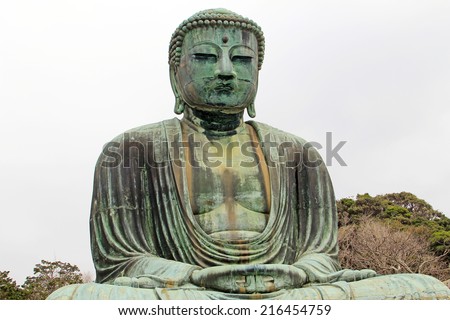 KAMAKURA, JAPAN - MARCH 29,2012 : Daibutsu statue at Kotoku-in temple on March 29, 2012 in Shinjuku ,A monumental outdoor bronze statue of Amida Buddha which is one of the most famous icons of Japan.