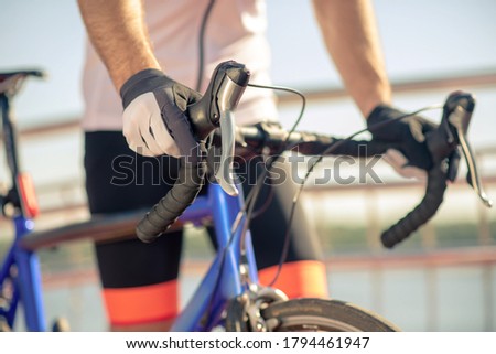 Similar – Image, Stock Photo Cyclist, not holding holds