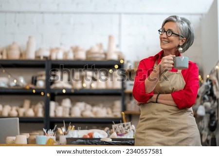 Similar – Image, Stock Photo Senior craftswoman in art studio