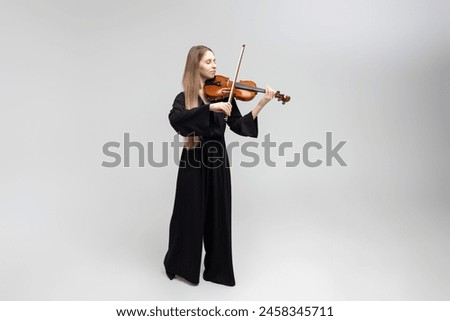 Similar – Image, Stock Photo Girl playing viola Viola