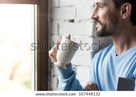 Purchase &middot; Delighted <b>optimistic man</b> looking into the window #507448132 - stock-photo-delighted-optimistic-man-looking-into-the-window-507448132