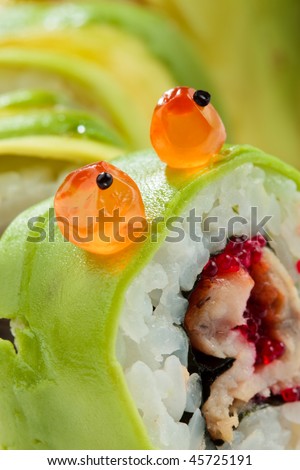 Avocado eel roll with pretty eyes closeup
