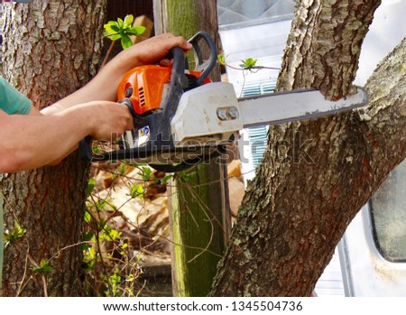 Similar – Image, Stock Photo Unrecognizable handyman using machine on factory