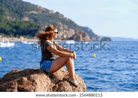 Similar – Image, Stock Photo Rippling sea with rocky coast in twilight