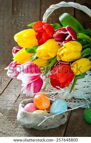 Easter tulip flowers in wooden background