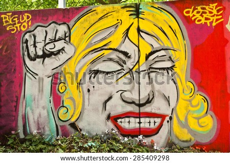 MULHOUSE - France - 07 June 2015 -  graffiti of angry woman during the BOZAR graffiti festival - quay of sinners in Mulhouse