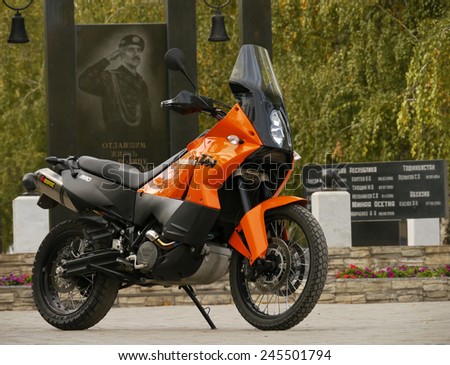 Buzuluk, Russia - October 6, 2010: the Monument to the soldiers and the eternal flame in front of the monument in Buzuluk, Russia - October 6, 2010. Motorcycle parked nearby.