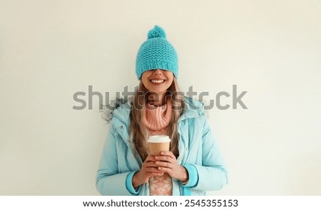Similar – Image, Stock Photo Woman in hat standing on beach and enjoying seascape