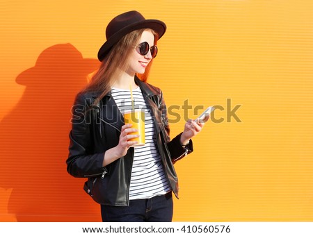 Similar – Image, Stock Photo Studio shot of pretty slim woman keeps hand in pocket, wears casual t shirt and jeans, stands in relaxed pose, looks at camera self confident, isolated over beige background talks casually with client