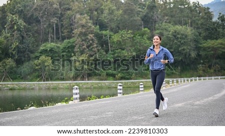 Similar – Image, Stock Photo Sporty woman running in forest