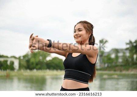 Similar – Woman stretching after running