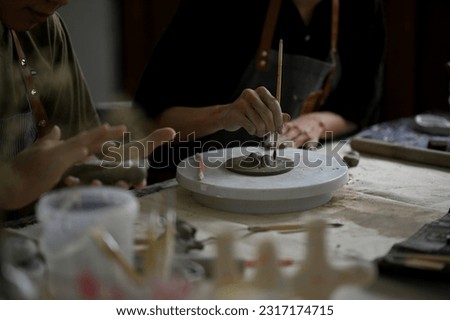 Similar – Image, Stock Photo Crop male ceramist creating cup