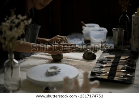 Similar – Image, Stock Photo Crop male ceramist creating cup