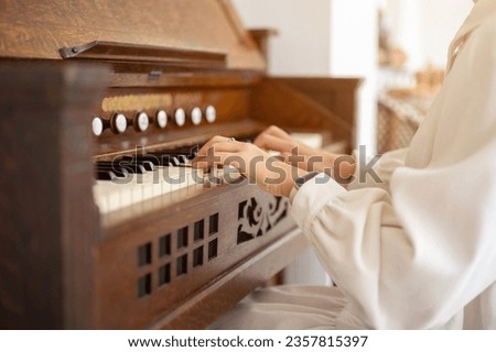 Similar – Image, Stock Photo Crop woman playing piano at home