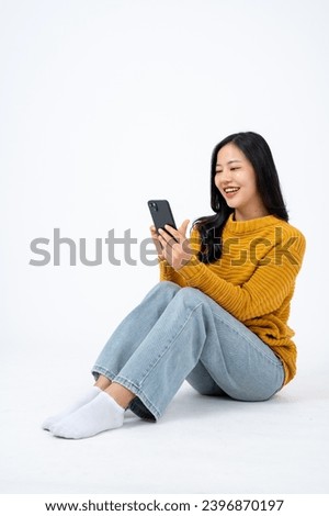 Similar – Foto Bild Frau mit Smartphone sitzt auf Steinstufen einer Treppe