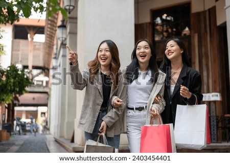 Similar – Image, Stock Photo Beautiful Asian girl walking on the beach in Autumn during her trip