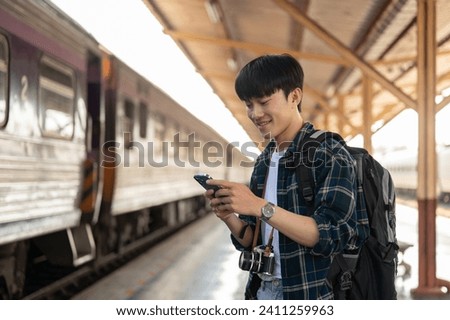 Similar – Foto Bild Männlicher Rucksacktourist in den Bergen am sonnigen Tag stehend