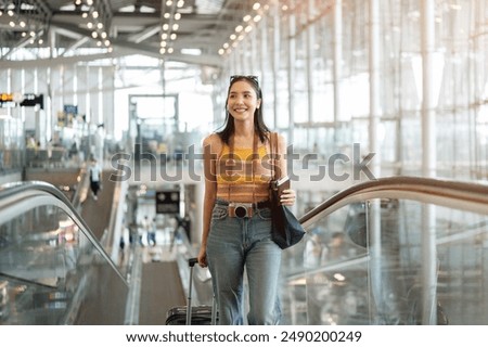 Image, Stock Photo Young woman traveler checking writing on smart phone during sunset day at Iceland, close up image.