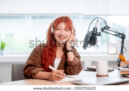 Image, Stock Photo Positive female radio host in studio